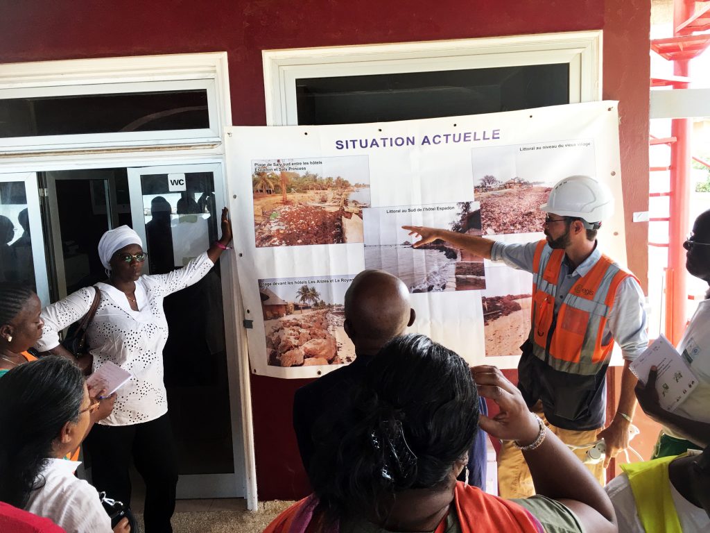 Engineer show chart depicting the restoration project in Saly's beach.