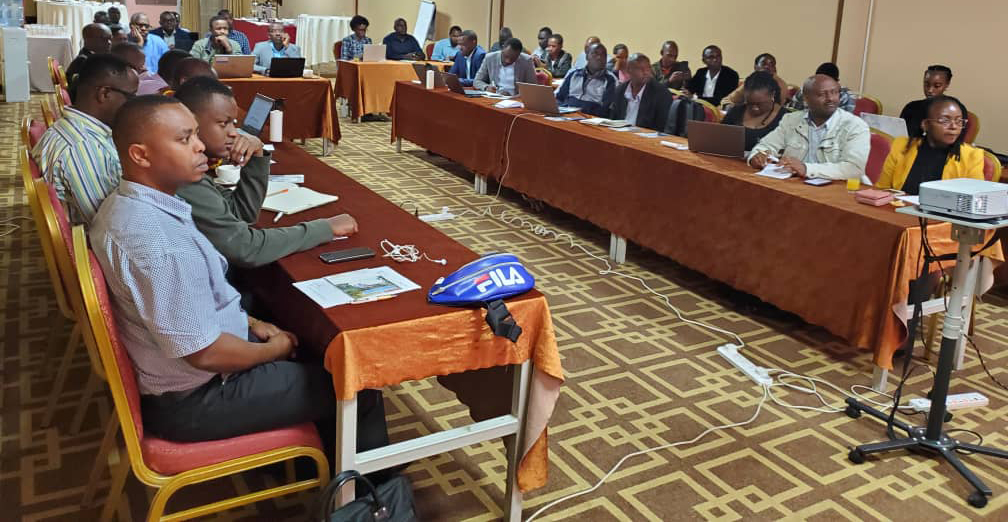 Participants of the Monitoring and Evaluation workshop in Rwanda looking at a presentation