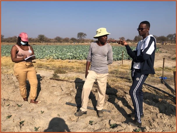 Namibia’s consultation team out in the fields to learn about the adaptation progress of farmers (with Farm Manager Mr. Ticharunga).